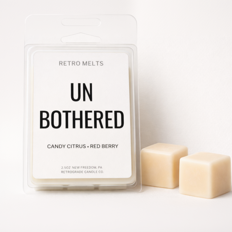 Packaging of Retro Melts 'Un Bothered' with two wax melts on a white background